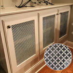 Cross-shaped hole in cabinet doors