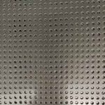 Four holes, evenly spaced in a straight arrangement.