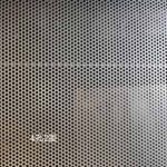 Four holes with two different spacings arranged in a staggered pattern.